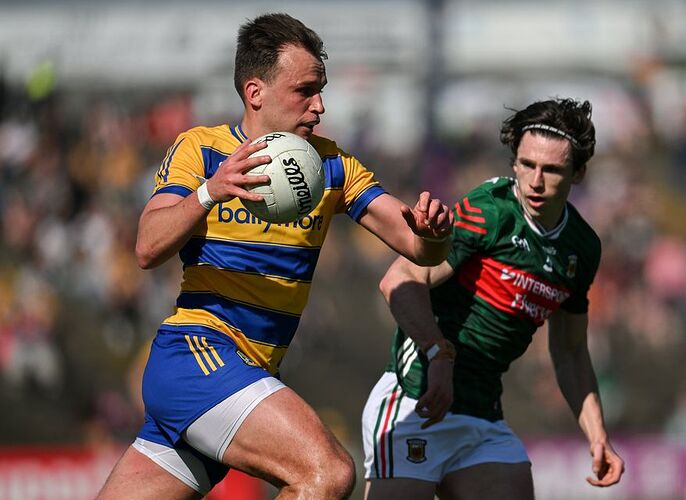 Roscommon's Enda Smith tries to get away from Mayo's Sam Callinan their Connacht SFC semi-final last month at Hastings Insurance MacHale Park in Castlebar. Photo: Paul Phelan/Sportsfile