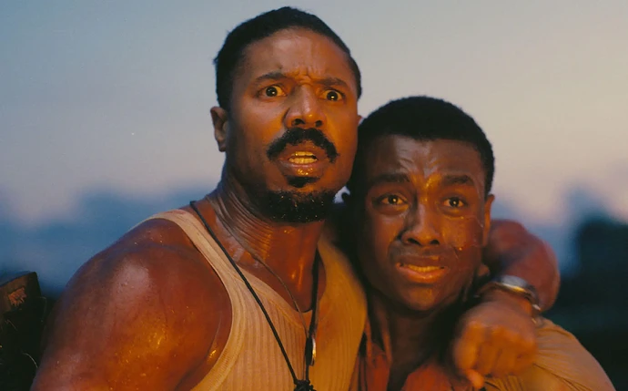 Michael B. Jordan and Miles Caton in a film still from "Sinners (2025)."