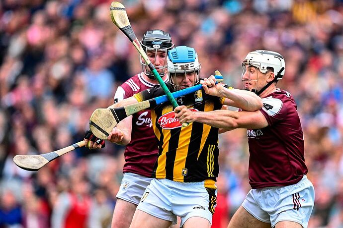 Kilkenny's TJ Reid is tackled by Galway's Pádraic Mannion and Daithí Burke. Photo: Ray McManus/Sportsfile