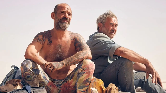 Richard Bellamy and Sergei Lopez in Sirat 2025 Neon.