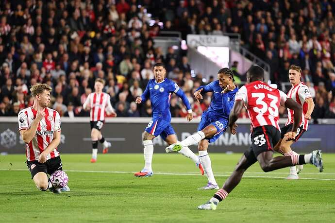 Brentford's Nathan Collin blocks a shot by Joao Pedro of Chelsea at Gtech Community Stadium on Saturday. Photograph: Jack Thomas/Getty Images