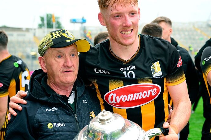Kilkenny kit man 'Rackard' Cody, holding the Bob O'Keeffe Cup, celebrates with Kilkenny captain John Donnelly. Photo: Ray McManus/Sportsfile