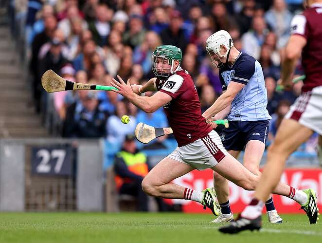 Dublin's Conal Ó Riain scores a goal ahead of Cathal Mannion of Galway in the Leinster SHC final at Croke Park on June 6th. Photograph: Tom O’Hanlon/Inpho
