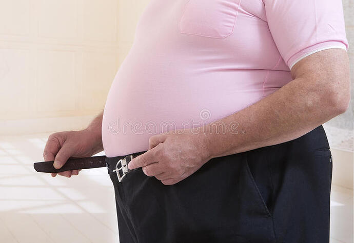 fat-senior-man-trying-to-close-his-belt-overweight-difficulty-trousers-47310648