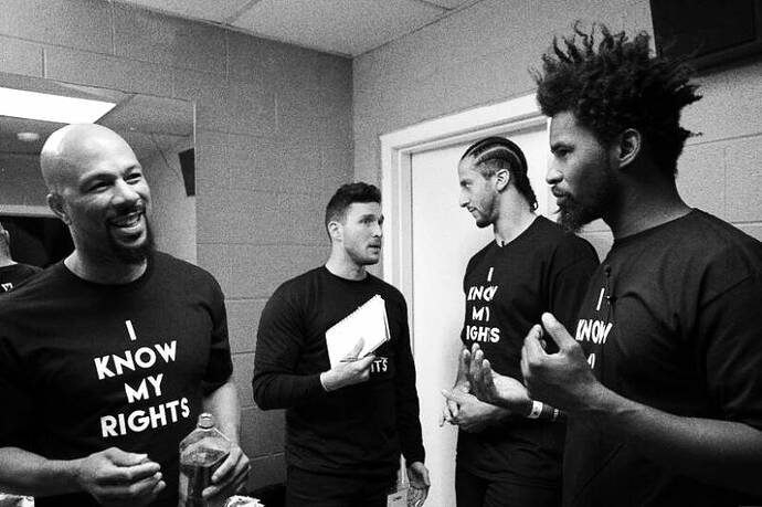 Colin backstage with Common (left) and Ameer “Left” Loggins (right) at the Know Your Rights Camp in Chicago, which Colin paid for out of his own pocket. “Colin represents an inconvenience,” Loggins says.