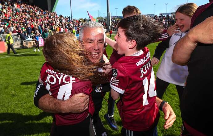 Galway manager Pádraic Joyce celebrates with his daughter Jodie and son Charlie after the 2025 Connacht final win over Mayo in Castlebar. Photograph: Ryan Byrne/Inpho