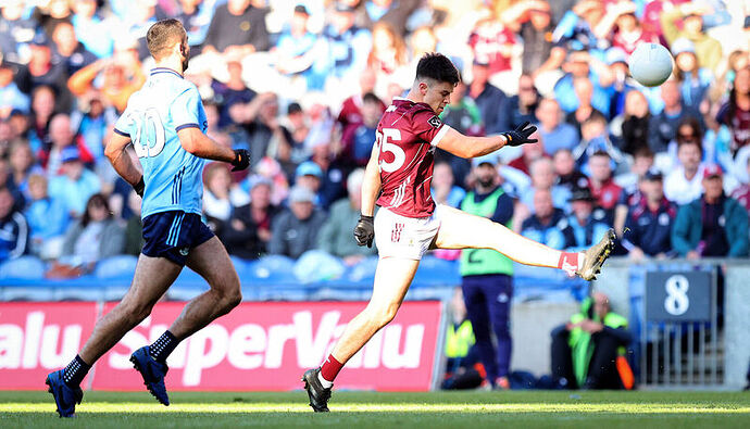 Galway’s Tomo Culhane kicks the winning point in the 2024 All-Ireland SFC quarter-final against Dublin. Pic: ©INPHO/Ryan Byrne