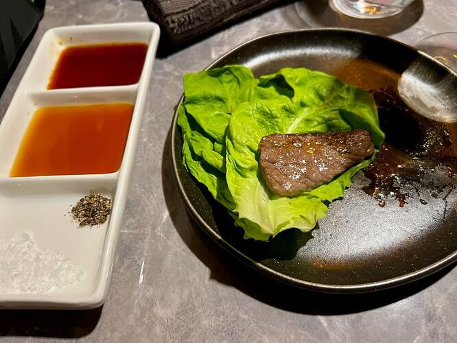 Lettuce leaves and slice of Japanese wagyu A5 premium tenderloin. Photo: Lucinda O'Sullivan.
