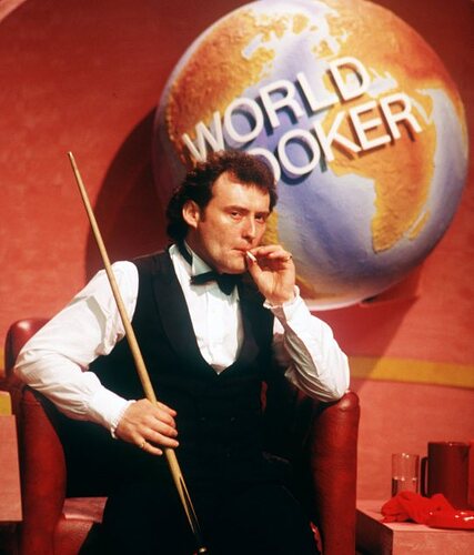 Jimmy White smoking a cigarette at the Embassy World Snooker Championship.
