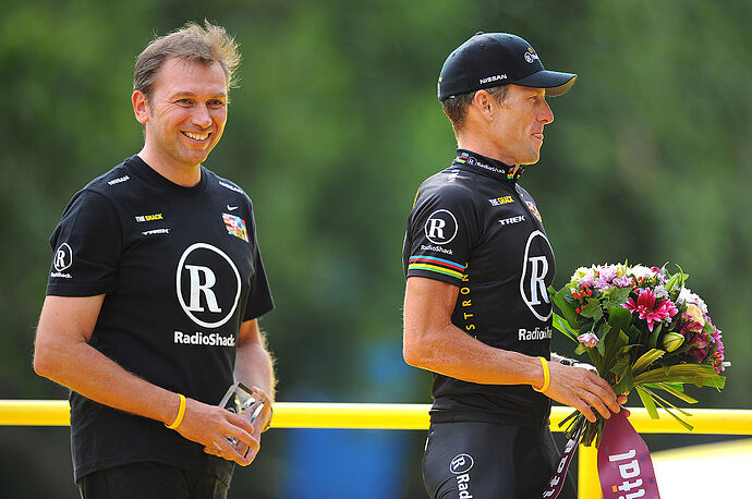 Cycling: 97th Tour de France 2010 / Stage 20Podium / ARMSTRONG Lance (USA)/ Johan BRUYNEEL (Bel) Sportsdirector Team Radioshack (Usa)/ Longjumeau - Paris Champs-Elysees (102,5 Km)/ Ronde van Frankrijk / TDF / Rit Etape / (c)Tim De Waele