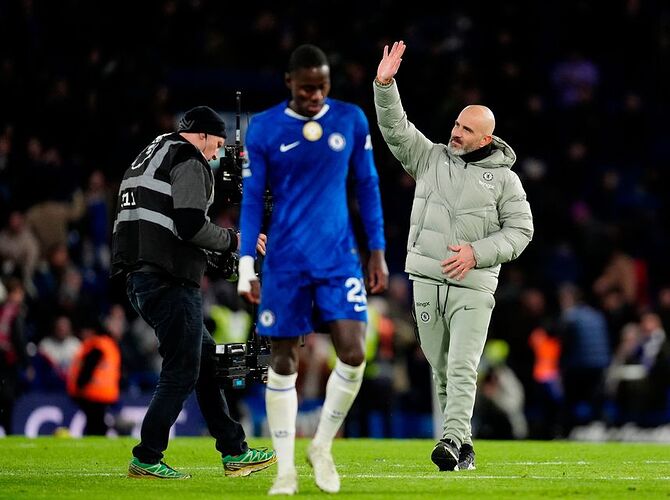 Chelsea boss Enzo Maresca salutes the Stamford Bridge crowd after the 1-1 draw with Arsenal. Photo: PA