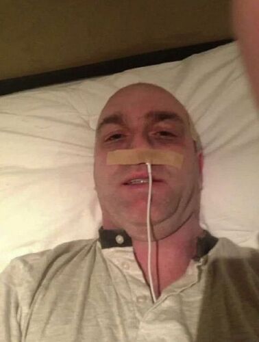 DJ Carey with a phone charger up his nose