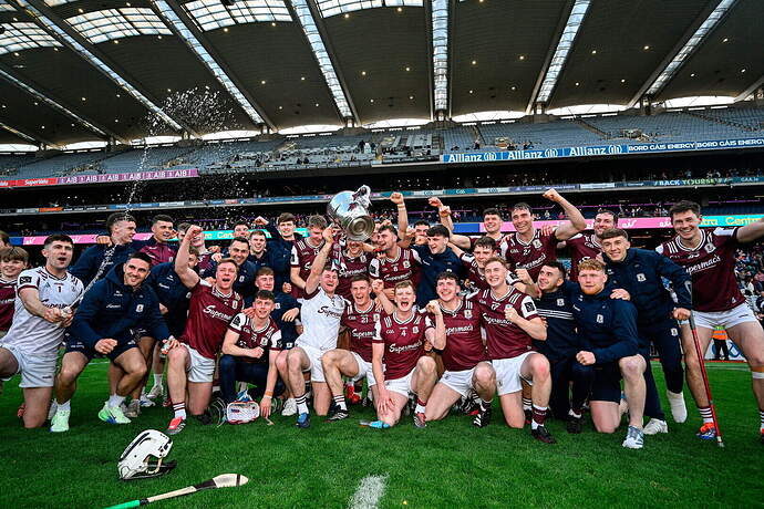Galway players celebrate with the Bob O'Keeffe Cup after beating Dublin at Croke Park