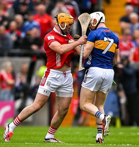 Declan Dalton of Cork and Bryan O'Mara of Tipperary tussle before throw in during the Munster GAA Hurling Senior Championship Round 2 match between Cork and Tipperary. Pic: Brendan Moran/Sportsfile