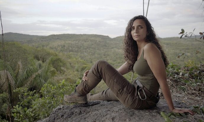 Ella-Al-Shamahi-Sitting-on-Rock-in-Amazon-Credit-Marie-Claire-Thomas_1504x1000-qefvee3nxqisze4tbmfll9q0ku48978jdh0dyuaf74-2996238012