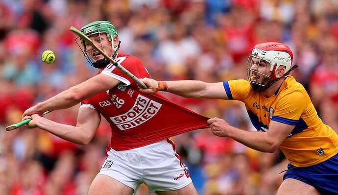 All-Ireland hurling final 2024: Cork’s Robbie O' Flynn is tackled by Conor Leen of Clare as he tries for a late point to level the game in extra time. Photograph: James Crombie/Inpho