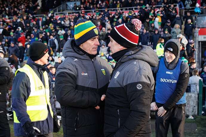 Pádraic Joyce talks to Donegal manager Jim McGuinness after a league game in 2025. Photograph: Ben Brady/Inpho