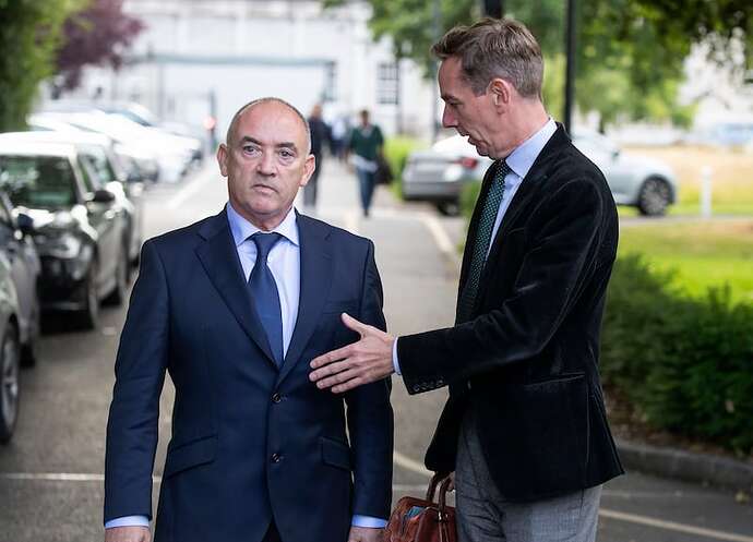 Noel Kelly and Tubridy leaving the Public Accounts Committee. Photograph: Colin Keegan/Collins